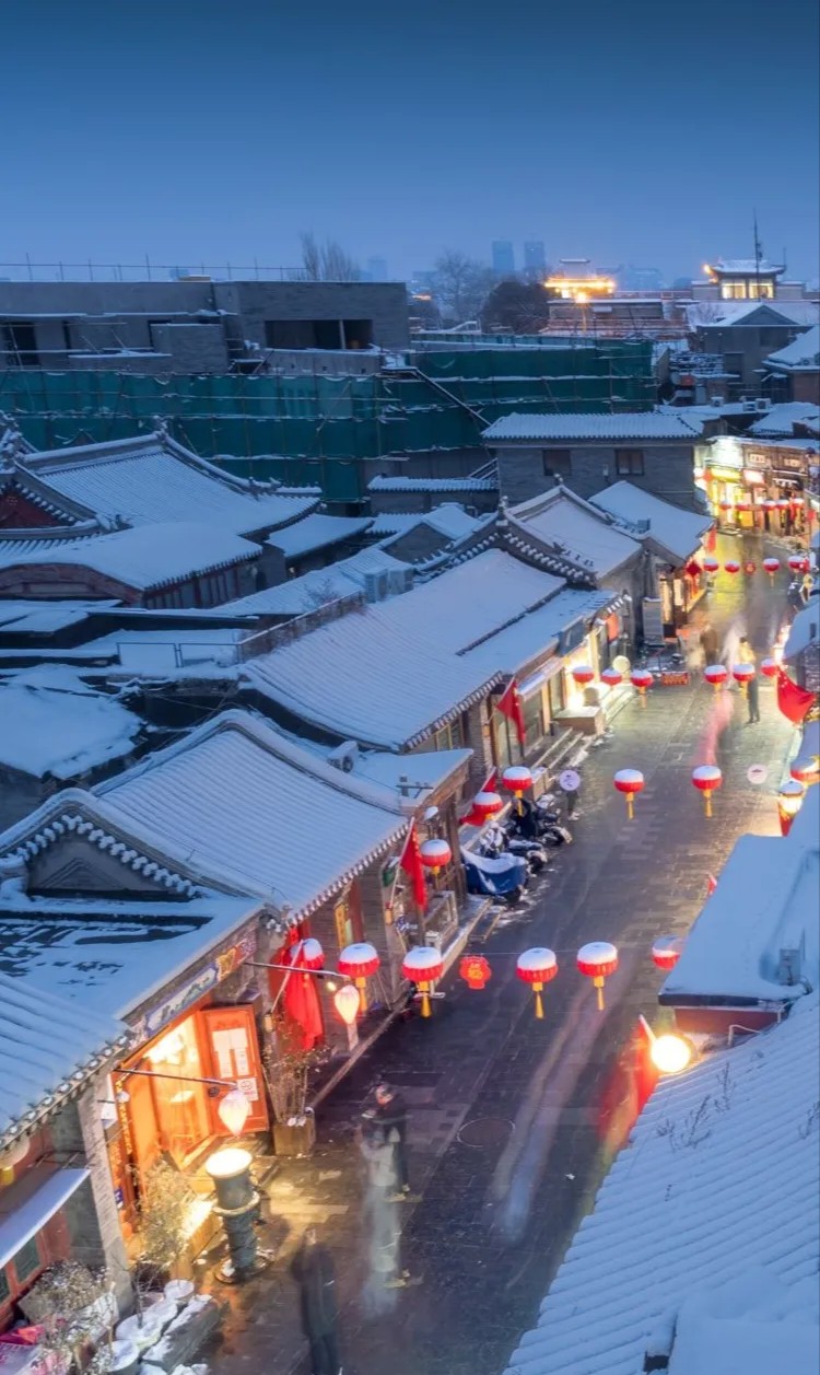 Snow-covered Beijing hutongs, showing traditional alleyways and local winter life..jpg